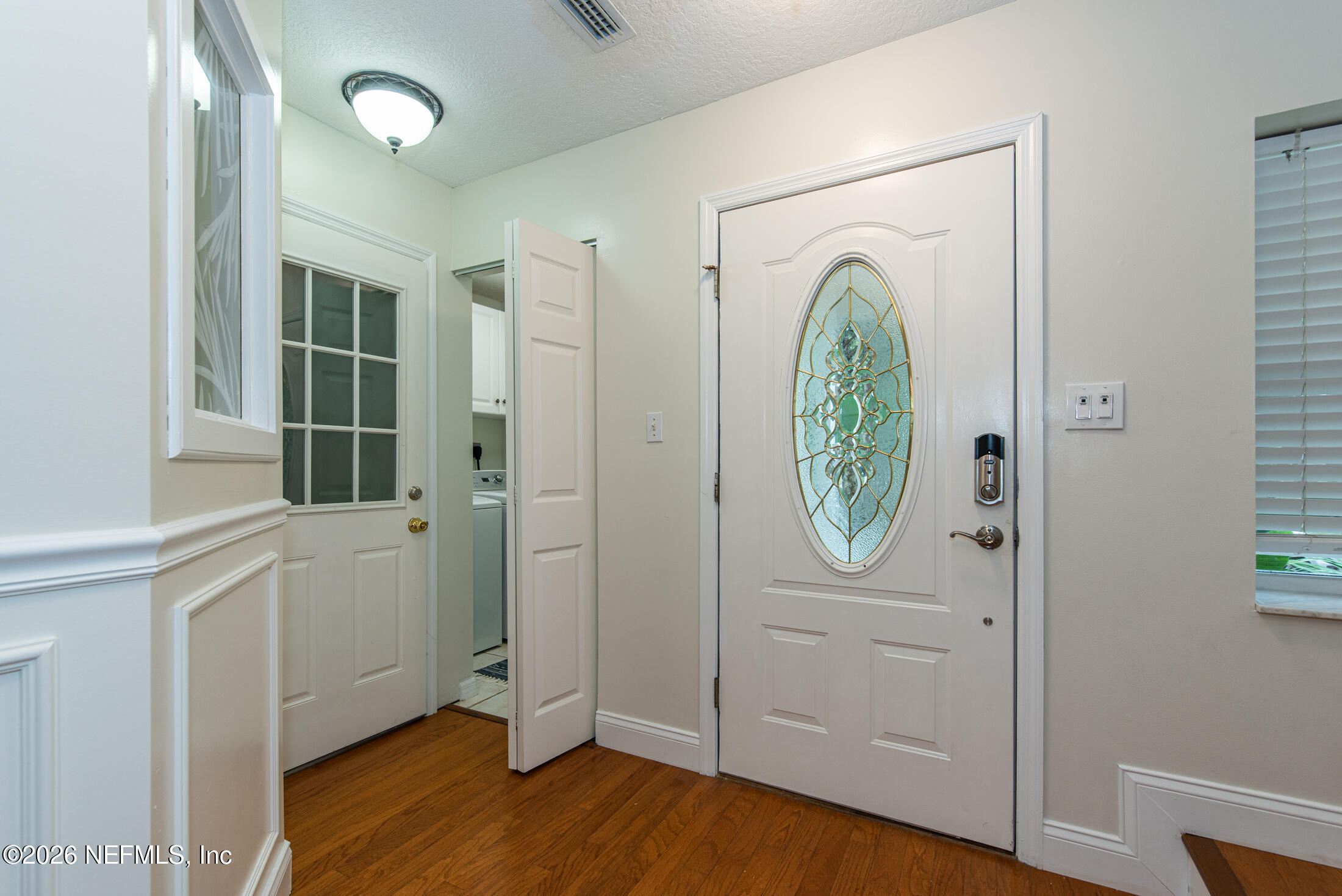 35 Oak Street St. Augustine, FL 32084 - Photo 13 of 43 a view of a hallway with wooden floor