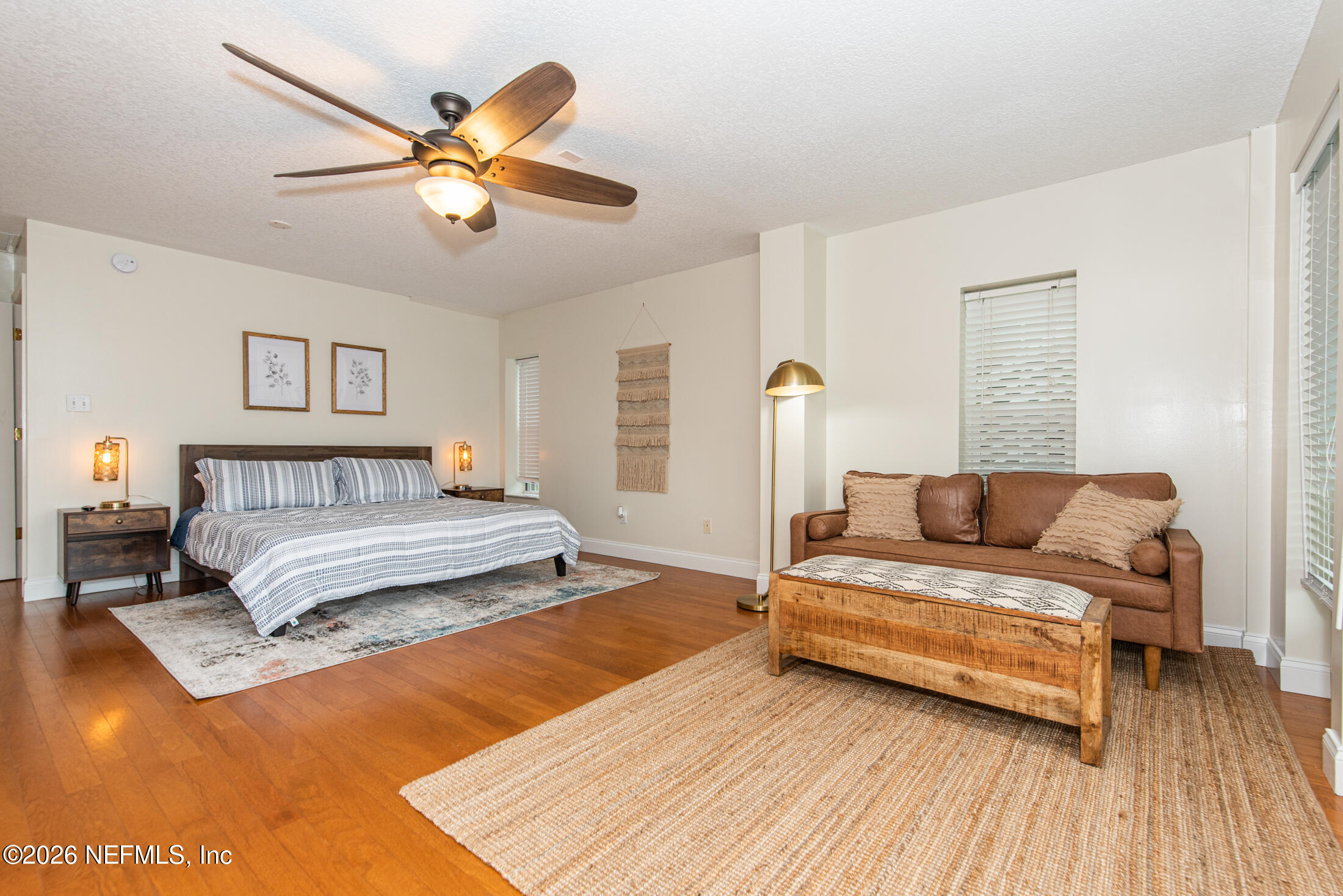 35 Oak Street St. Augustine, FL 32084 - Photo 14 of 43 a bedroom with a bed and a ceiling fan