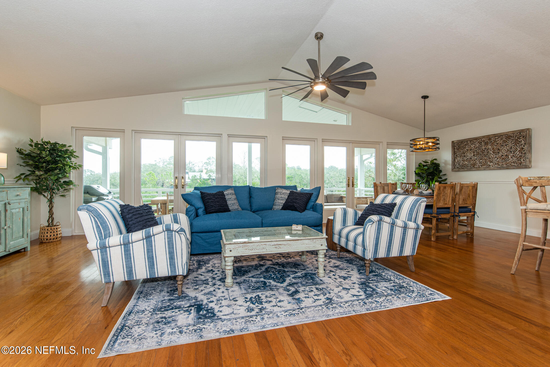 35 Oak Street St. Augustine, FL 32084 - Photo 23 of 43 a living room with furniture and a large window