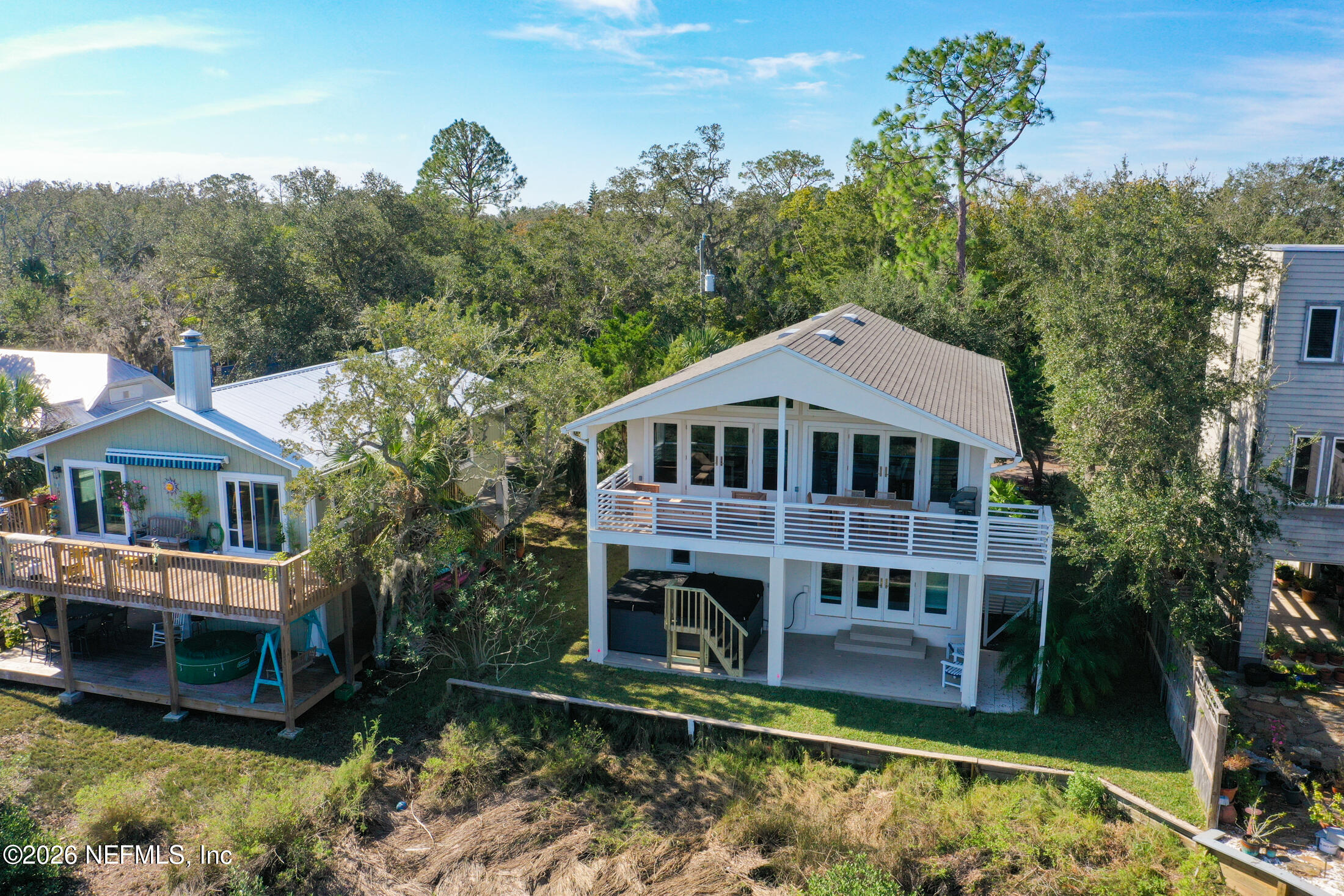 35 Oak Street St. Augustine, FL 32084 - Photo 3 of 43 a front view of a house with a yard