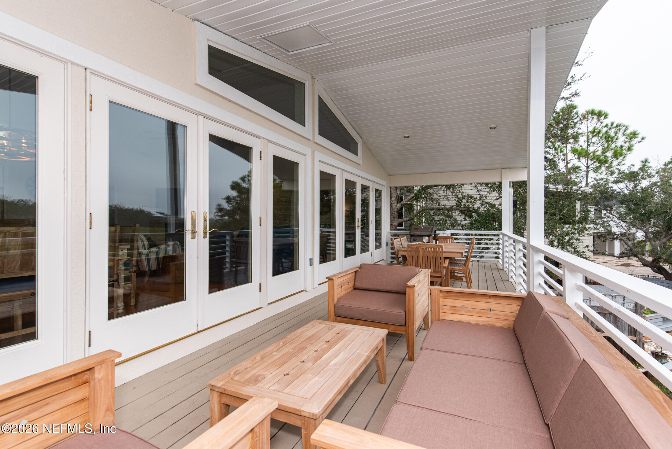 35 Oak Street St. Augustine, FL 32084 - Photo 37 of 43 a balcony with couch and large windows