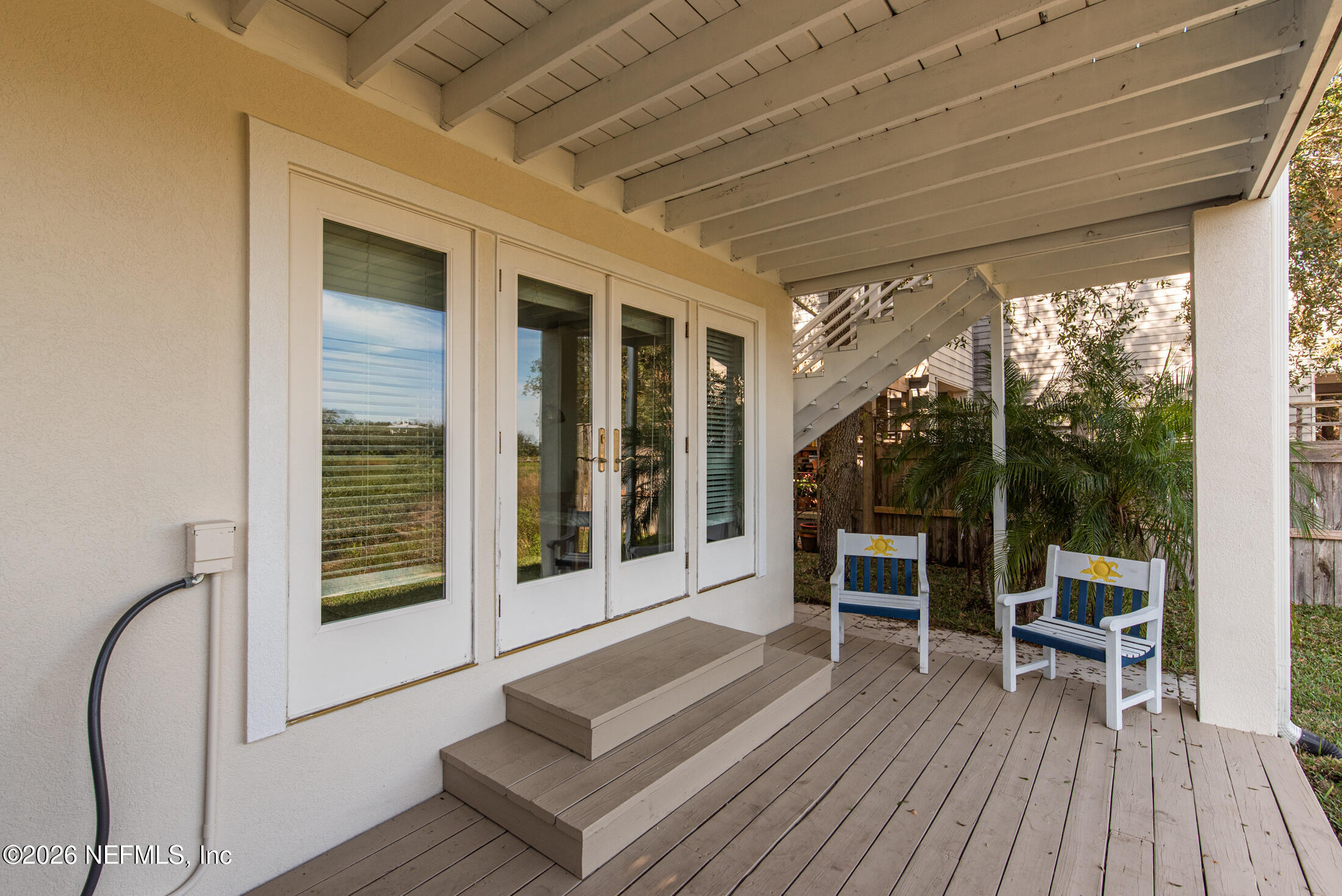 35 Oak Street St. Augustine, FL 32084 - Photo 40 of 43 a view of deck with chairs and wooden floor