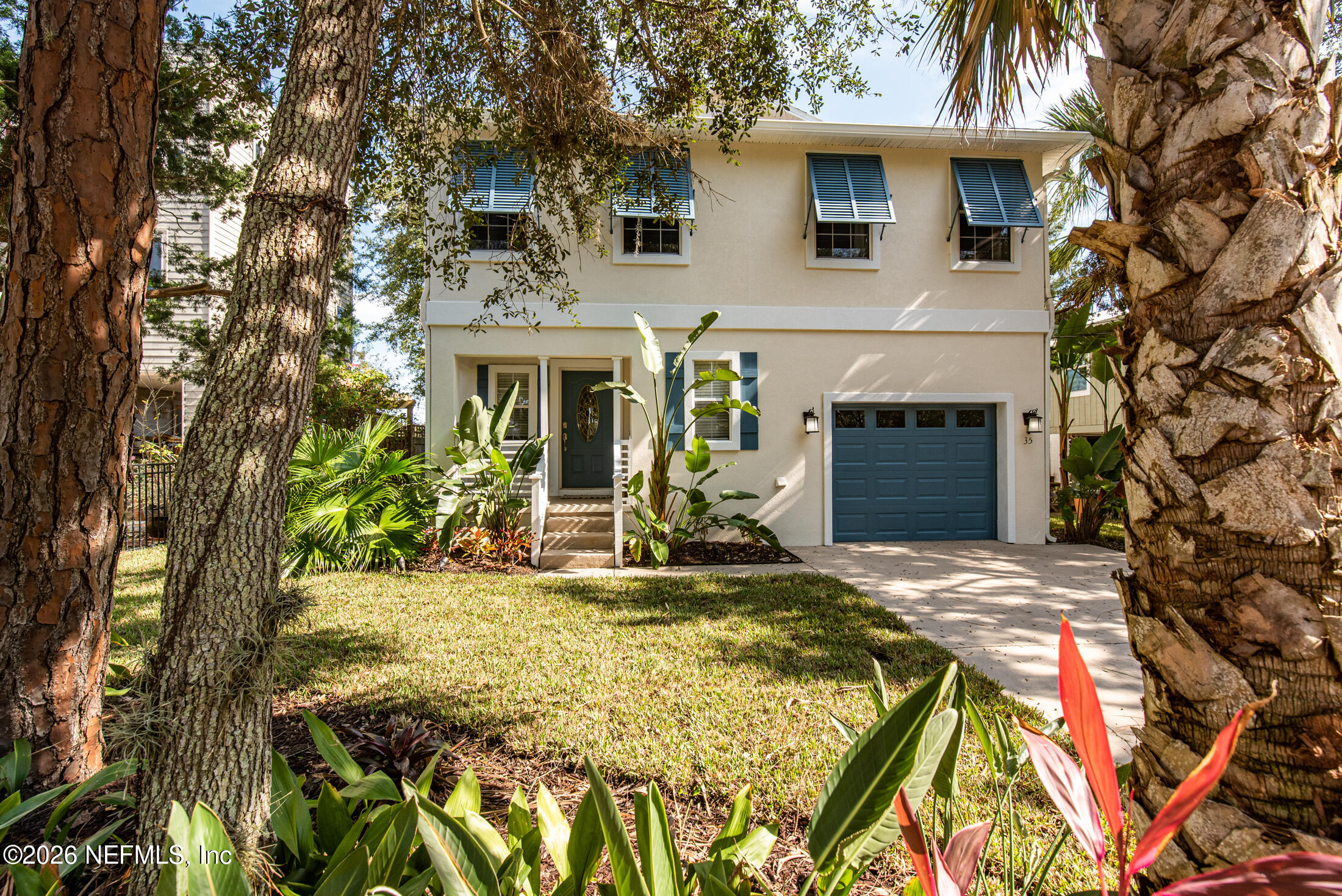 35 Oak Street St. Augustine, FL 32084 - Photo 8 of 43 a view of house with yard and outdoor seating