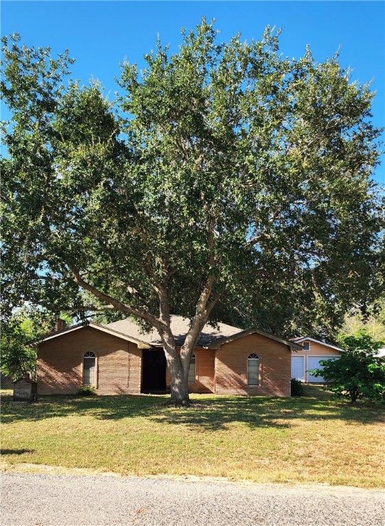 a house with trees in front of it