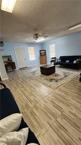 a view of kitchen and empty room