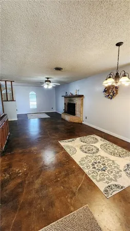 a view of a livingroom with wooden floor