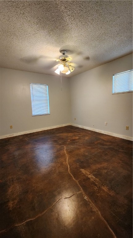 24887 County Road 350 Mathis, TX 78368 - Photo 10 of 18 an empty room with wooden floor and windows