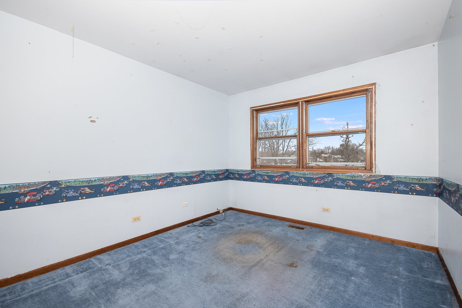 2880 Sun Valley Road Lisle, IL 60532 - Photo 12 of 29 a view of an empty room with a window