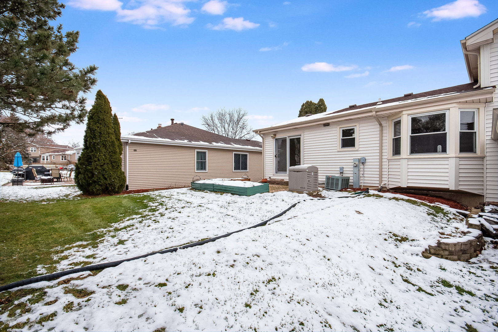 2880 Sun Valley Road Lisle, IL 60532 - Photo 25 of 29 a front view of a house with a garden