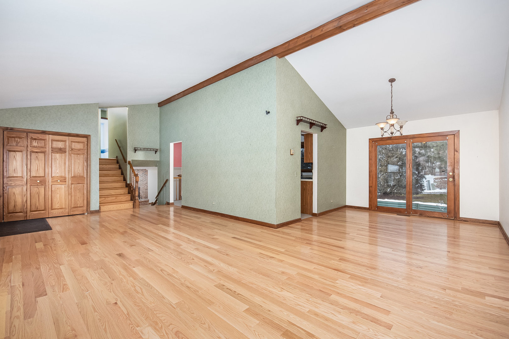2880 Sun Valley Road Lisle, IL 60532 - Photo 4 of 29 a view of empty room with wooden floor and fan