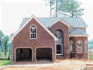 736 Seastone Street Raleigh, NC 27603 - Photo 1 of 1 a front view of a house with garden