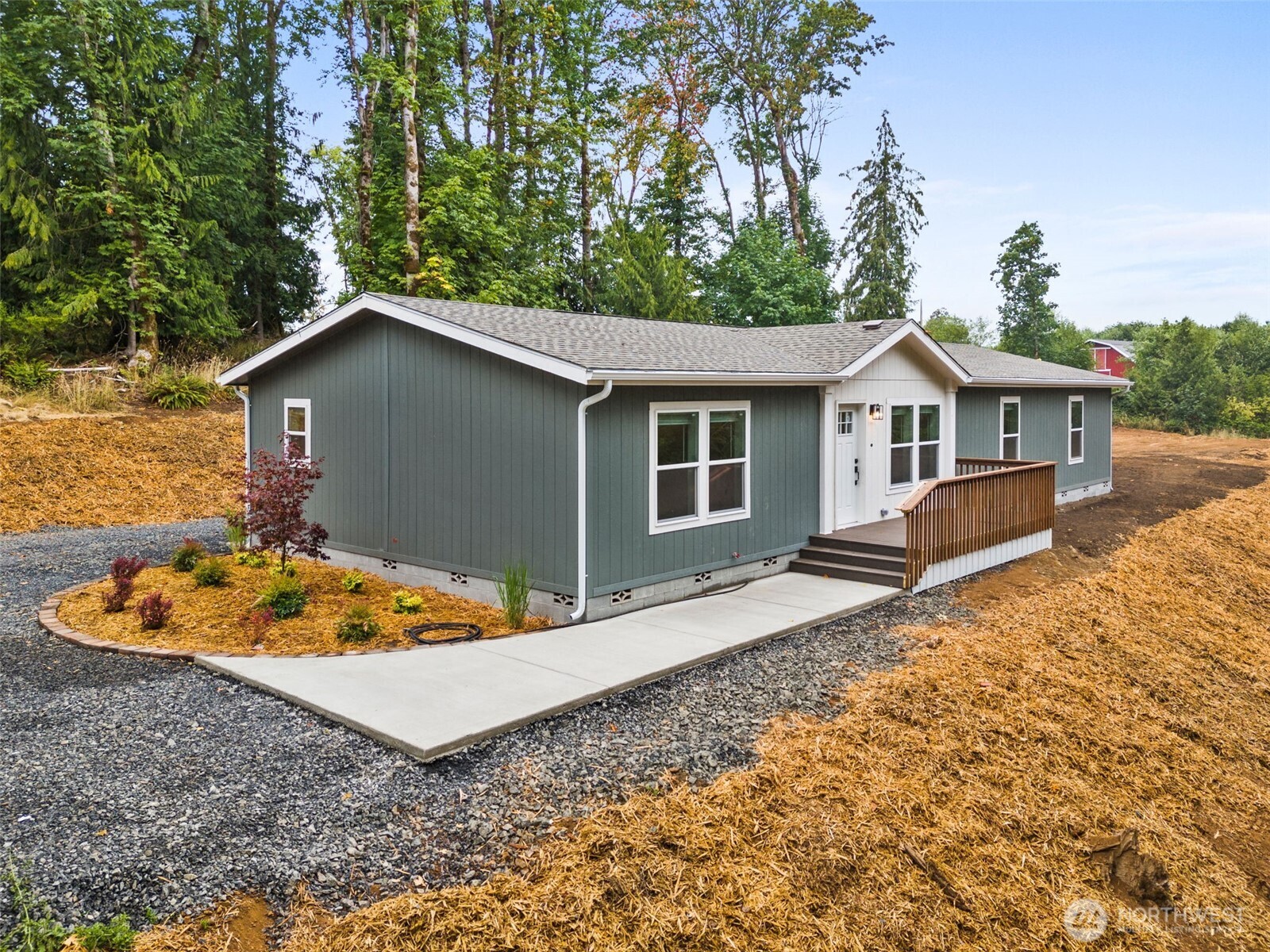 241 Pascoe Avenue Chehalis, WA 98532 - Photo 2 of 33 a house with trees in the background