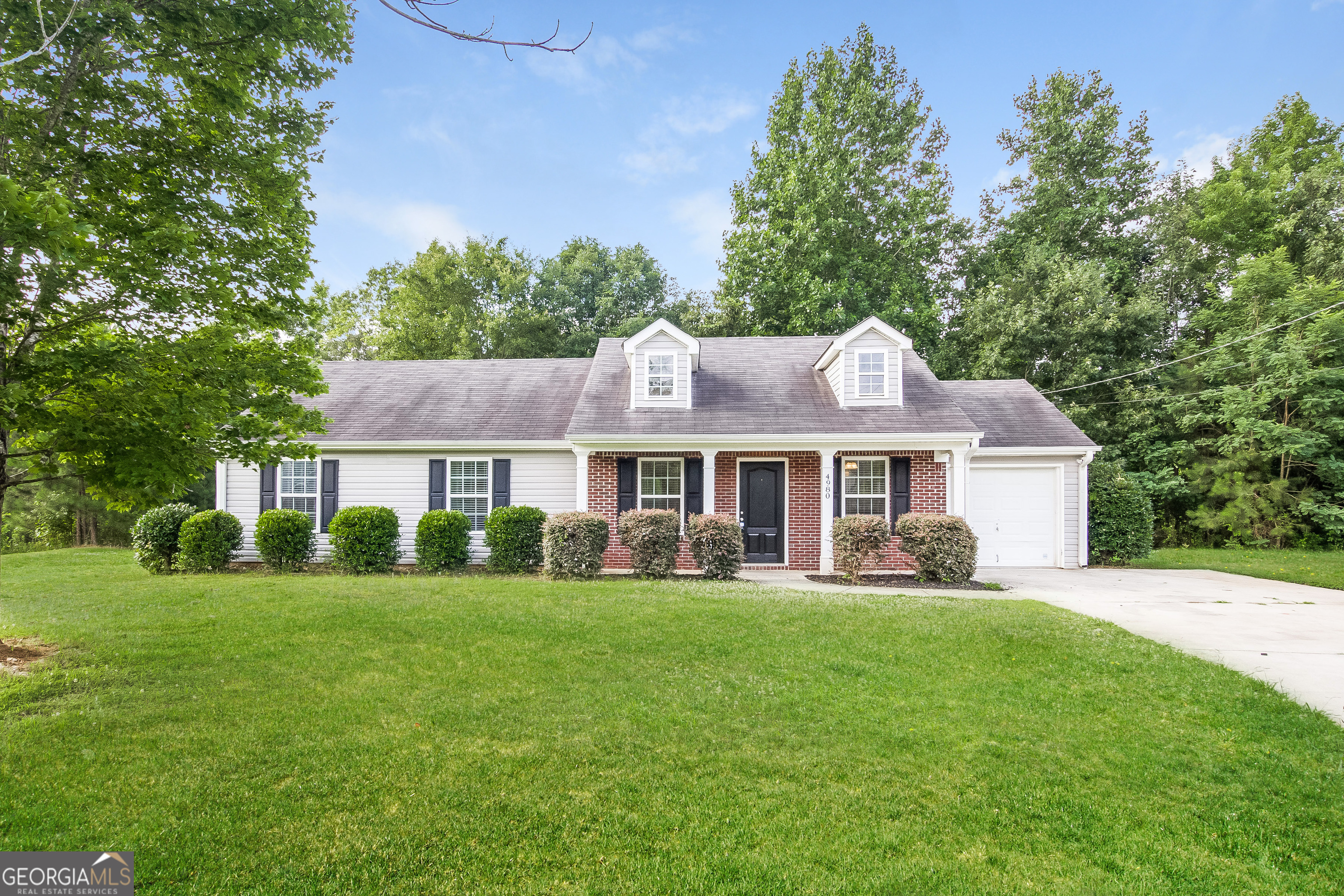 4980 Wolfcreek View South Fulton, GA 30349 - Photo 1 of 15 a front view of a house with a yard