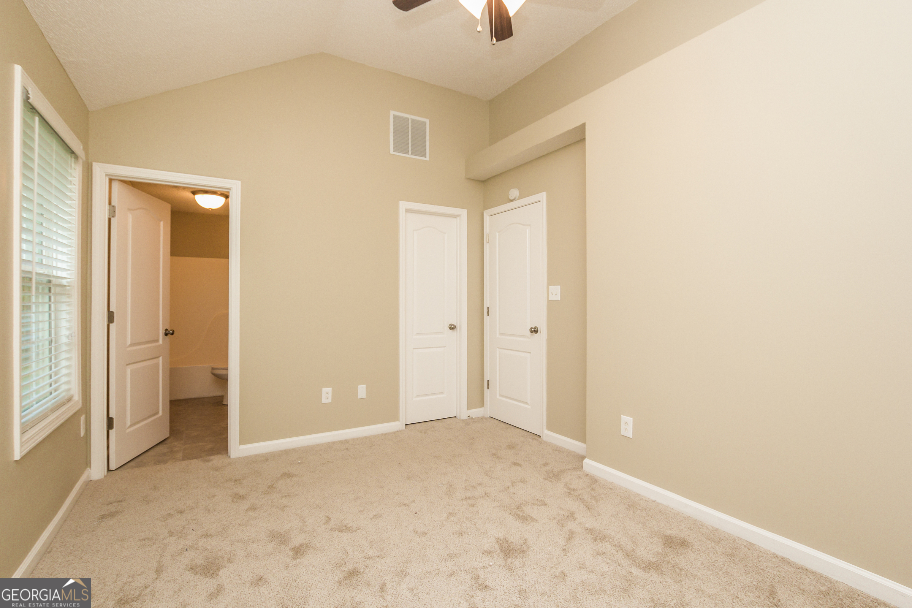 4980 Wolfcreek View South Fulton, GA 30349 - Photo 9 of 15 an empty room with a bathroom