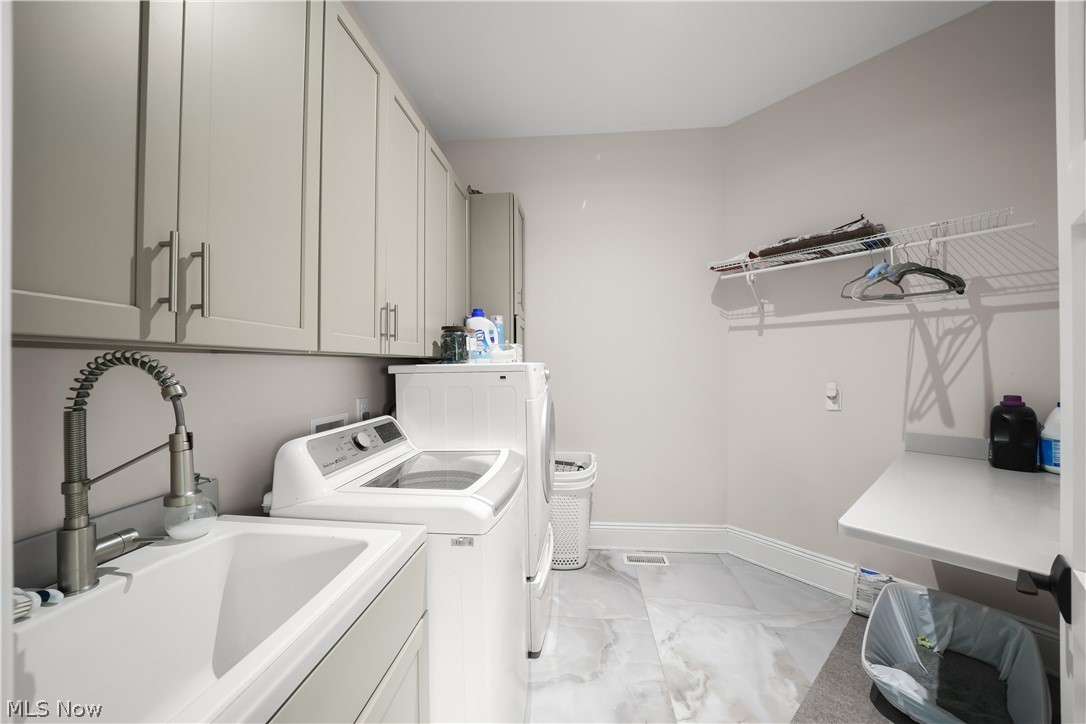 33553 Capel Road Columbia Station, OH 44028 - Photo 28 of 50 1st floor laundry located near master suite