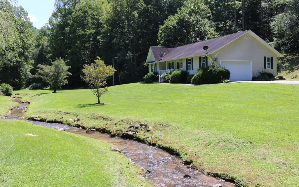 2153 Grape Creek Road Murphy, NC 28906 - Photo 1 of 1 a front view of a house with a yard
