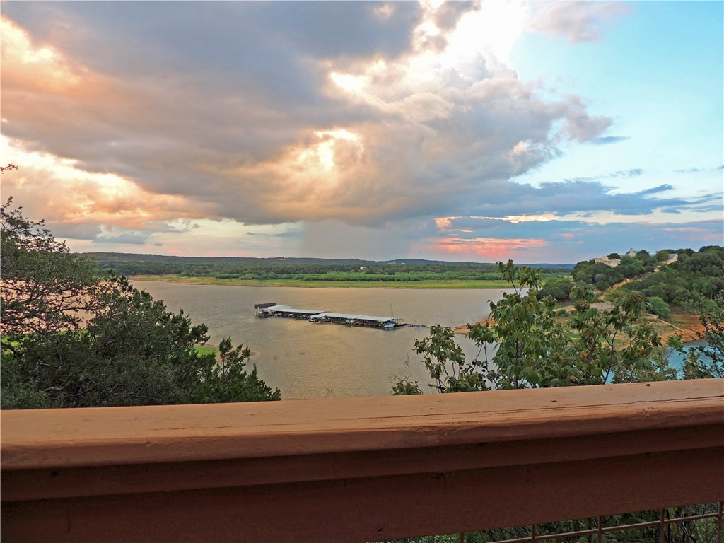 a view of a lake from a balcony