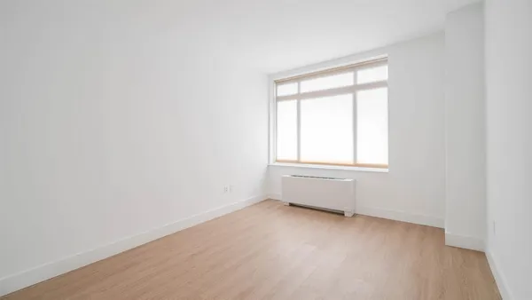 an empty room with a window