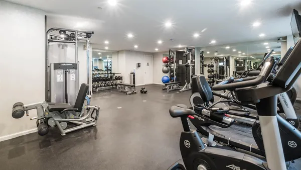 a view of a room with gym equipment