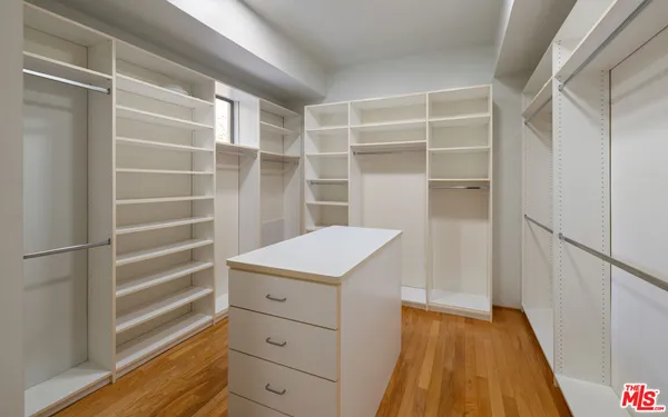 a room with a furniture and wooden floor