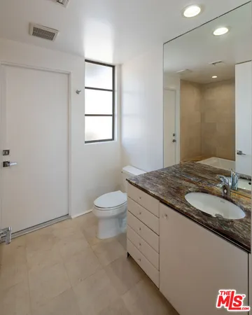 a car parked in front of a building