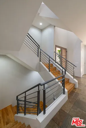 a view of a bathroom from the hallway