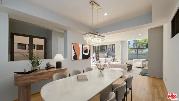 a view of a dining room with furniture window and outside view