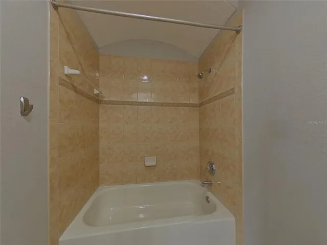a close view of a bathtub in bathroom
