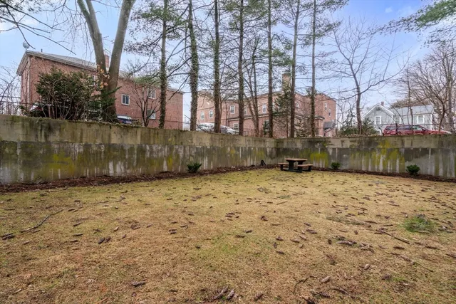 a backyard of a house with lots of green space