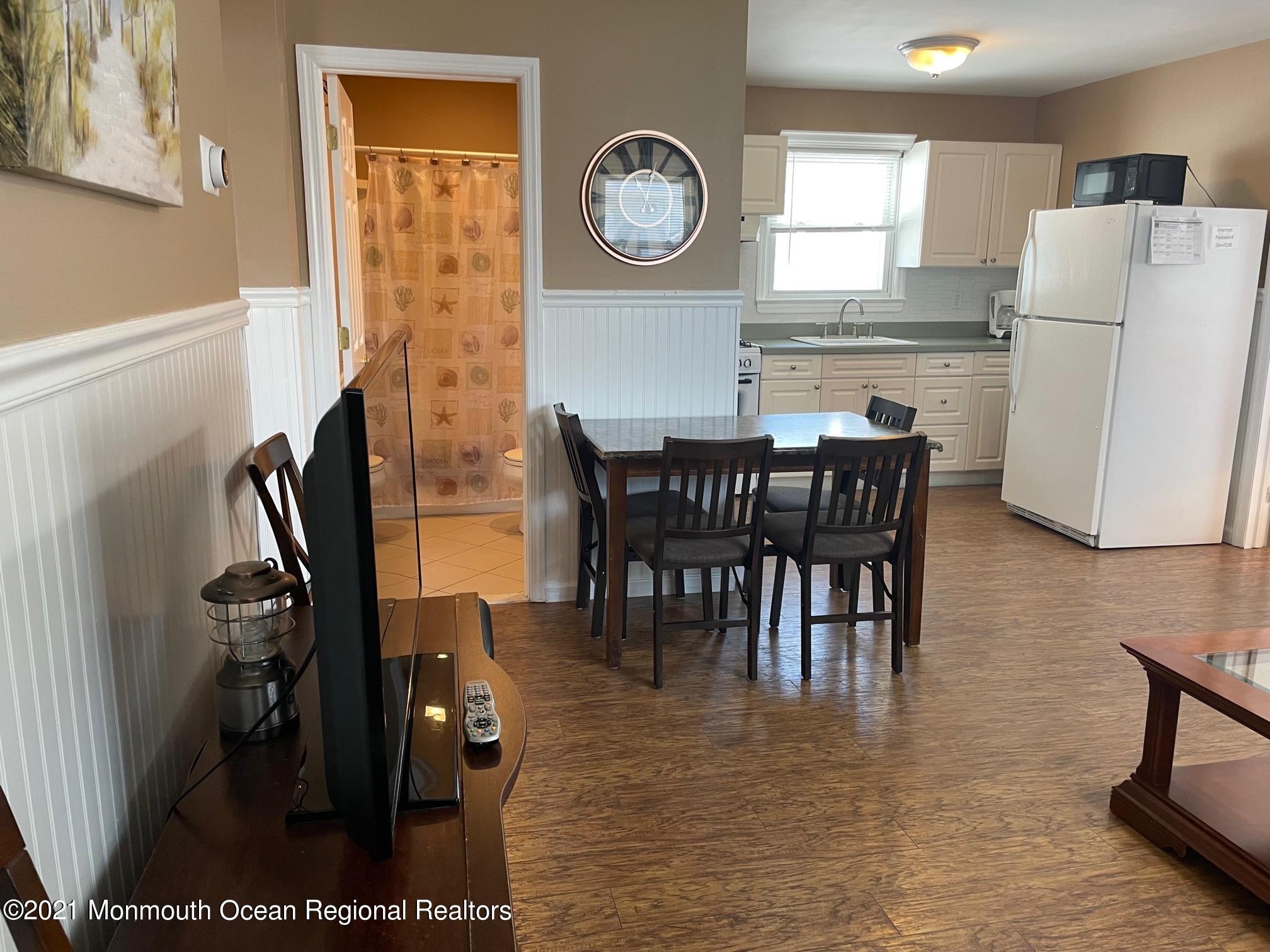 15 Elizabeth Avenue Lavallette, NJ 08735 - Photo 2 of 8 a view of kitchen with dining area and stainless steel appliances
