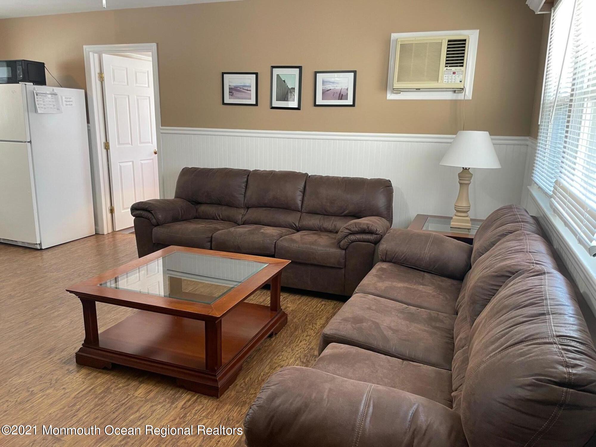 15 Elizabeth Avenue Lavallette, NJ 08735 - Photo 3 of 8 a living room with furniture and a window