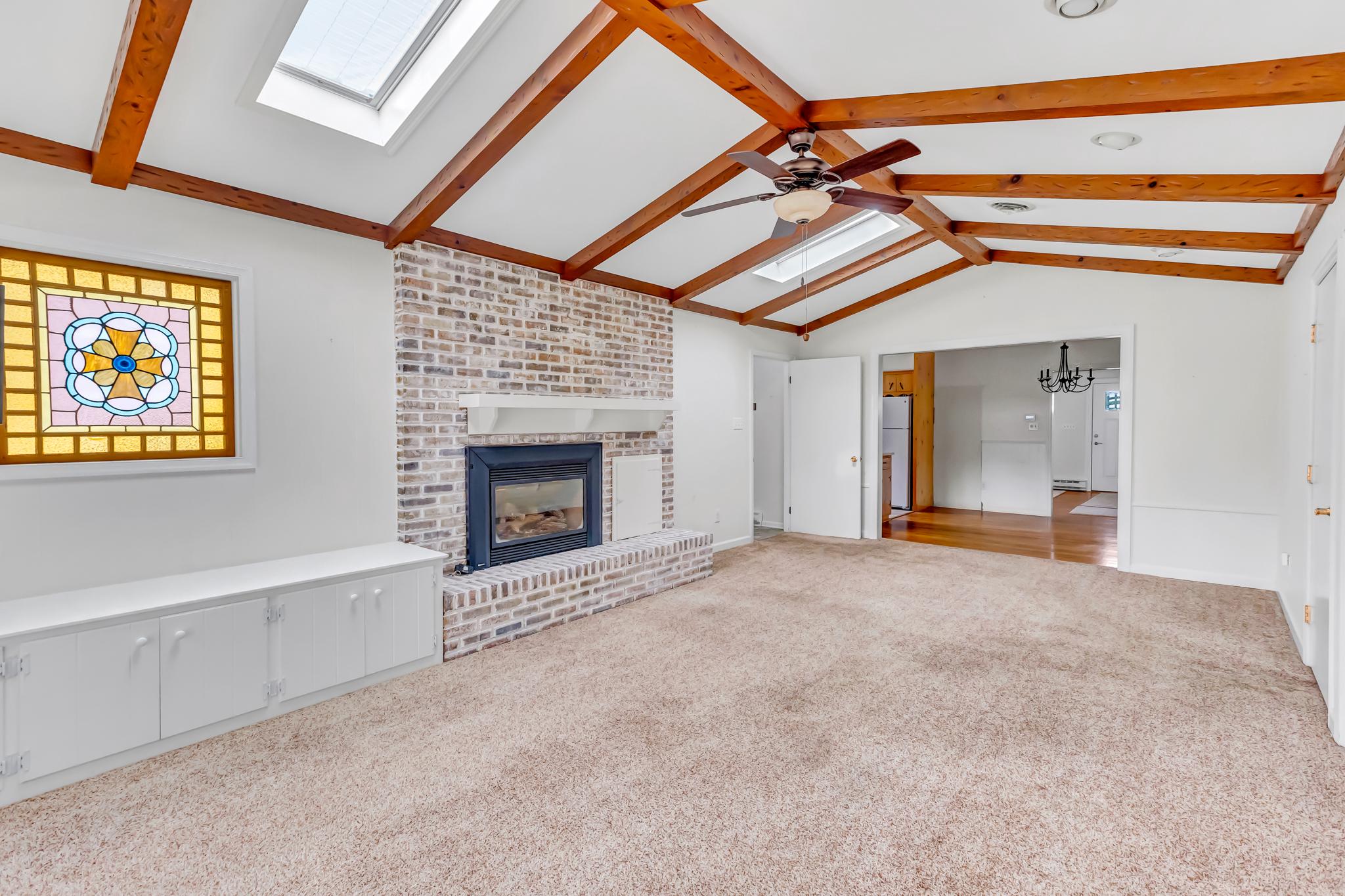 11163 Stewart Neck Road Princess Anne, MD 21853 - Photo 18 of 80 Large Den w/ Gas Fireplace & Built In Cabinets