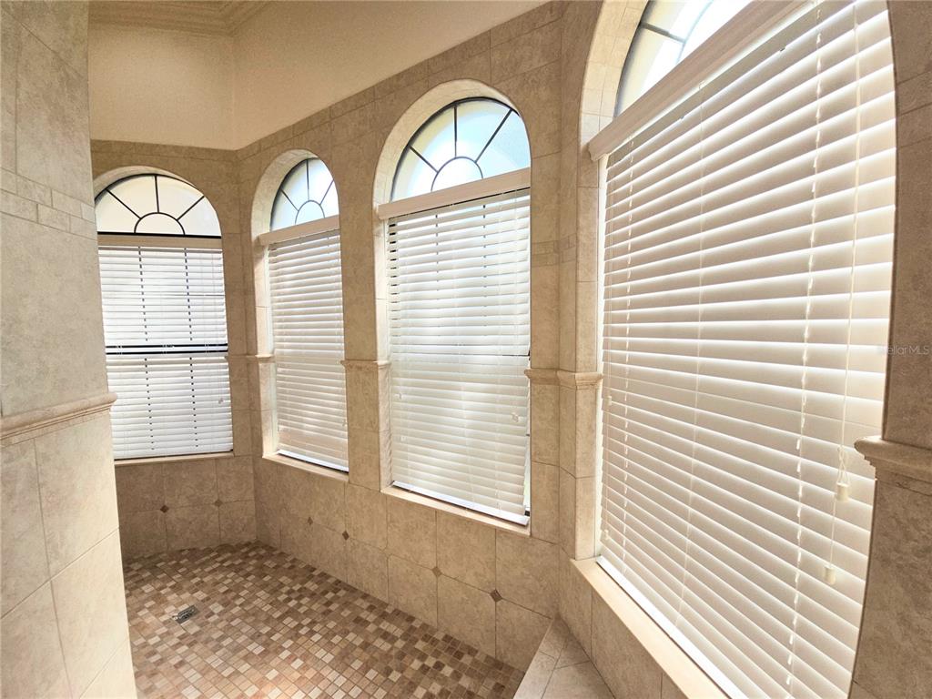 420 Muirfield Loop Reunion, FL 34747 - Photo 26 of 60 a view of a livingroom with a large window