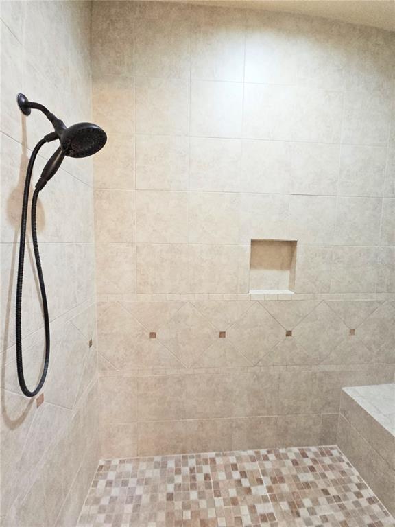 420 Muirfield Loop Reunion, FL 34747 - Photo 42 of 60 a bathroom with a shower