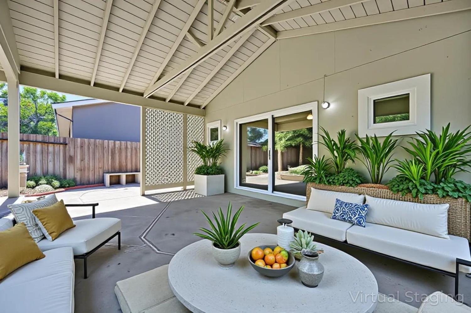 5824 Hesper Way Carmichael, CA 95608 - Photo 13 of 56 a view of a patio with couches table and chairs and potted plants