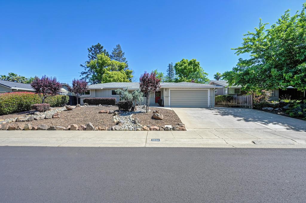 5824 Hesper Way Carmichael, CA 95608 - Photo 17 of 56 front view of a house with a outdoor space