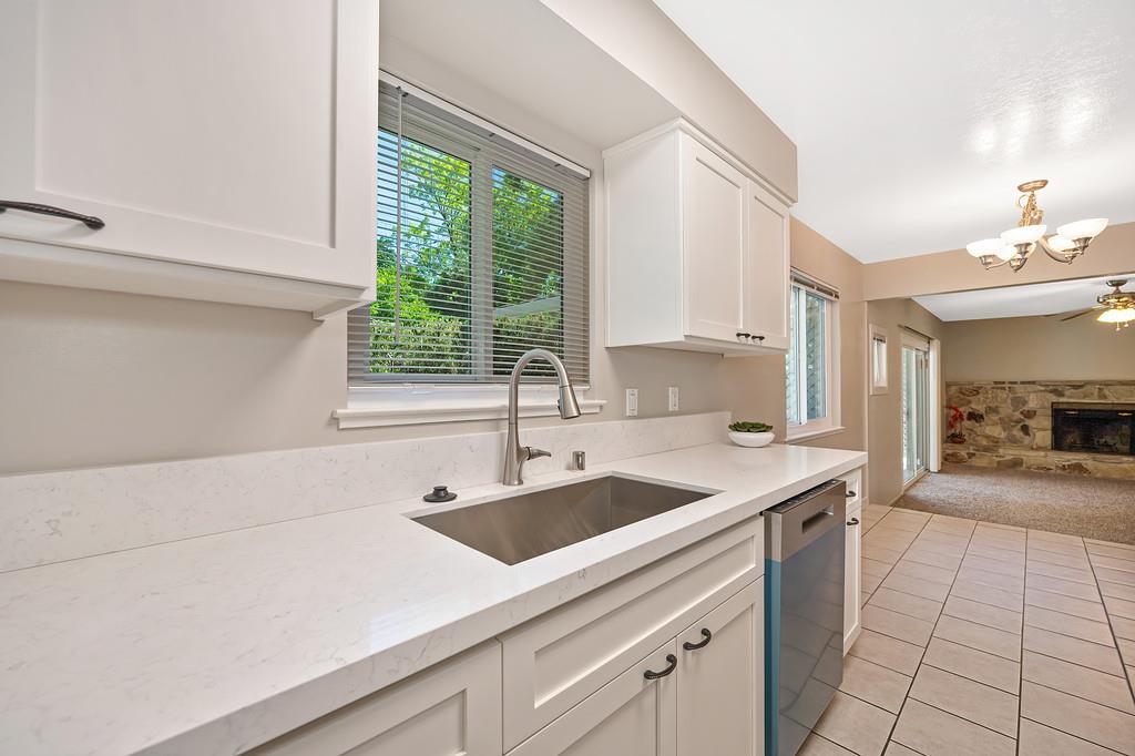 5824 Hesper Way Carmichael, CA 95608 - Photo 31 of 56 a kitchen with a sink cabinets and window