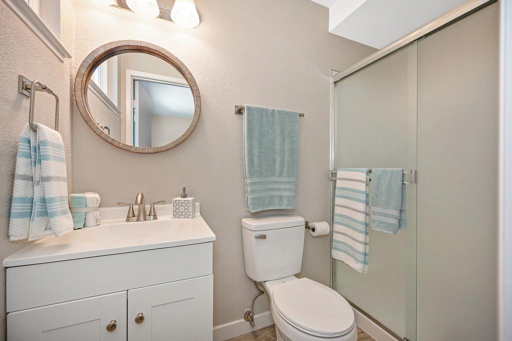 5824 Hesper Way Carmichael, CA 95608 - Photo 36 of 56 a white toilet sitting next to a bathroom sink