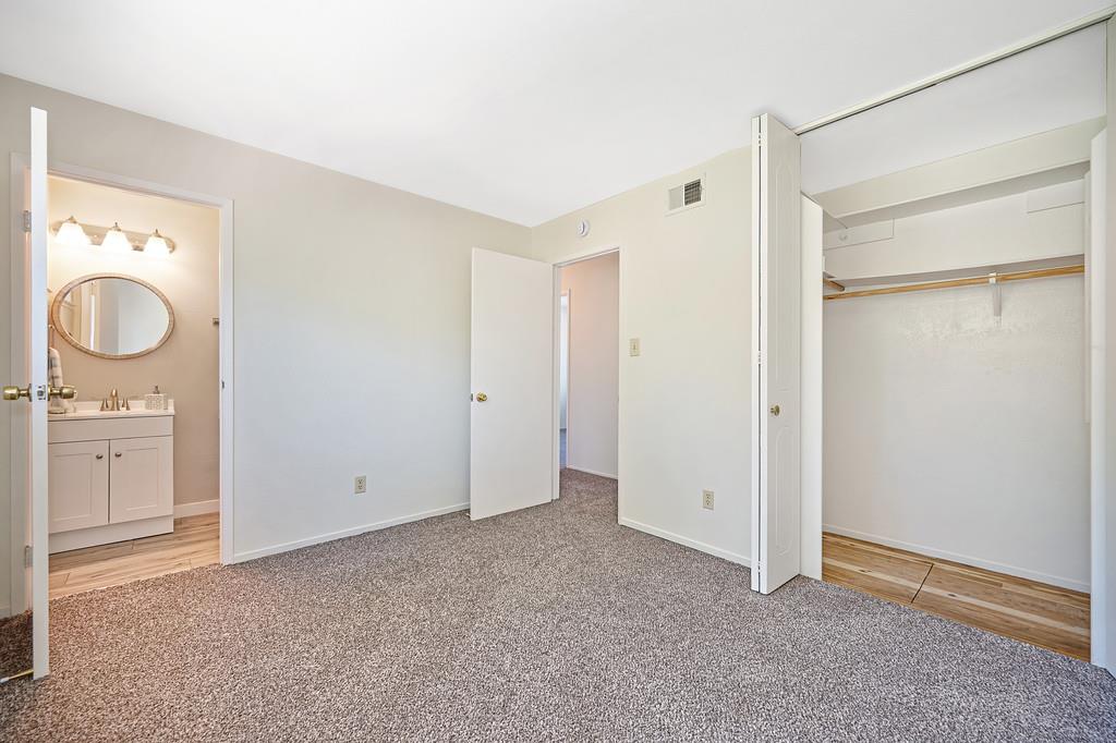 5824 Hesper Way Carmichael, CA 95608 - Photo 37 of 56 a view of an empty room with closet and a window