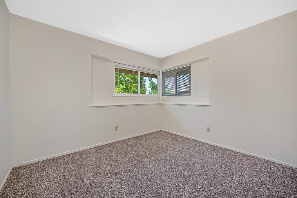 5824 Hesper Way Carmichael, CA 95608 - Photo 40 of 56 an empty room with windows
