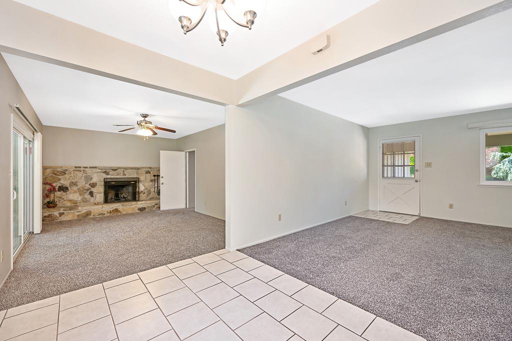 5824 Hesper Way Carmichael, CA 95608 - Photo 48 of 56 a view of a livingroom with wooden floor and a ceiling fan