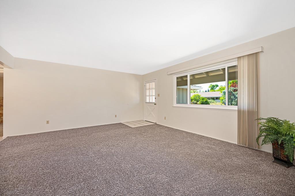 5824 Hesper Way Carmichael, CA 95608 - Photo 51 of 56 an empty room with windows and mirror