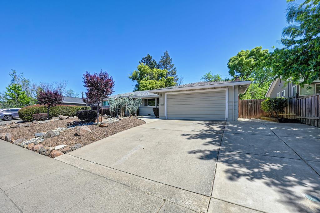 5824 Hesper Way Carmichael, CA 95608 - Photo 56 of 56 a view of a house with a backyard and a garage