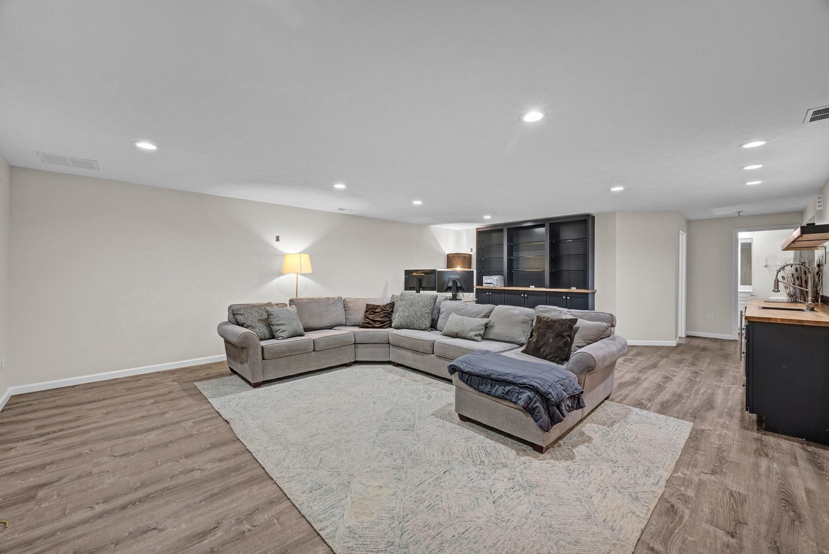277 Cassidy Road Normal, IL 61761 - Photo 24 of 42 a living room with furniture and a flat screen tv