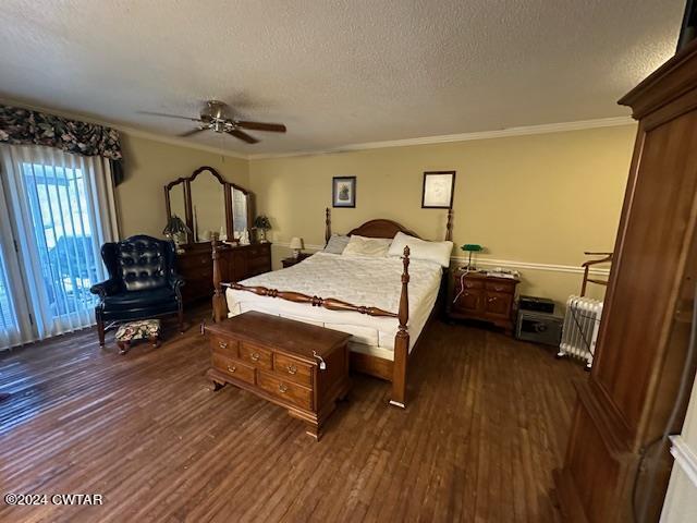 591 Asbury Road Camden, TN 38320 - Photo 12 of 38 a bedroom with a bed a table and chair