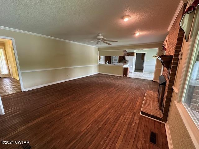 591 Asbury Road Camden, TN 38320 - Photo 22 of 38 a view of empty room with wooden floor and fan