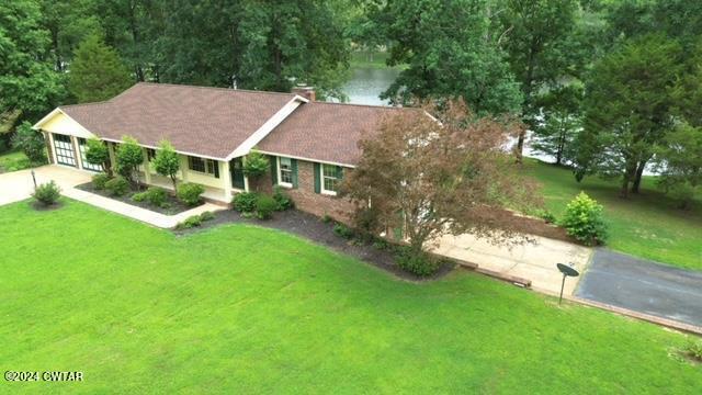591 Asbury Road Camden, TN 38320 - Photo 25 of 38 an aerial view of a house
