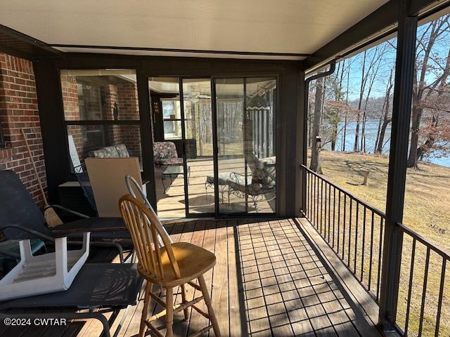 591 Asbury Road Camden, TN 38320 - Photo 30 of 38 a view of a room with furniture and floor to ceiling window