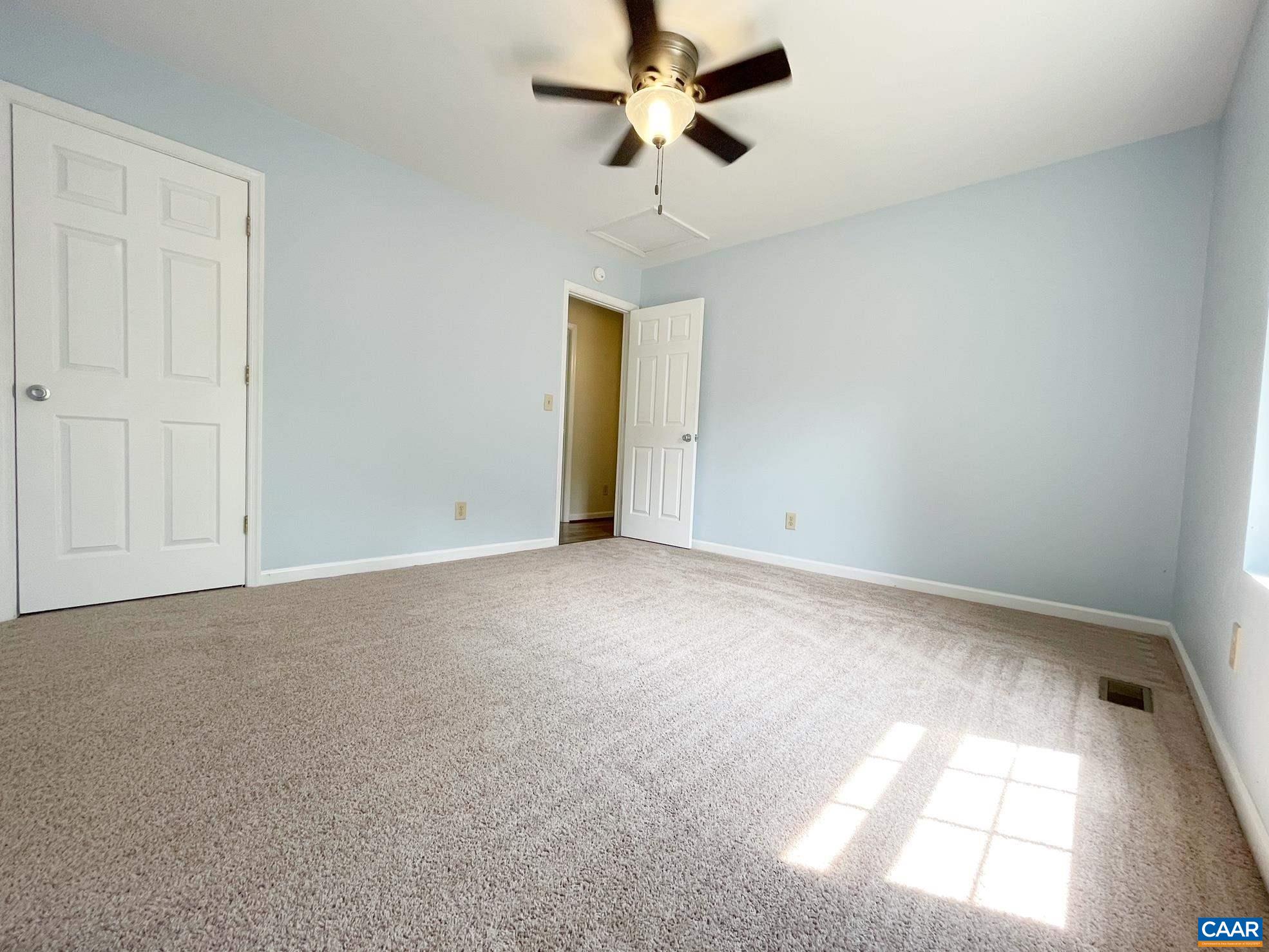 81 Phlox Road Ruckersville, VA 22968 - Photo 13 of 24 a view of an empty room and a window