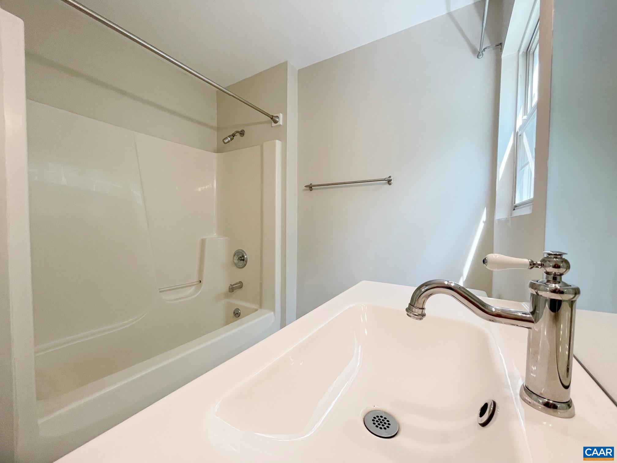 81 Phlox Road Ruckersville, VA 22968 - Photo 16 of 24 a bathroom with a shower and a sink